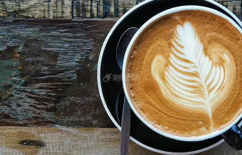directly-above-shot-of-cappuccino-served-on-table-654713939-5ac42a9ac5542e0037c3bc39.jpg